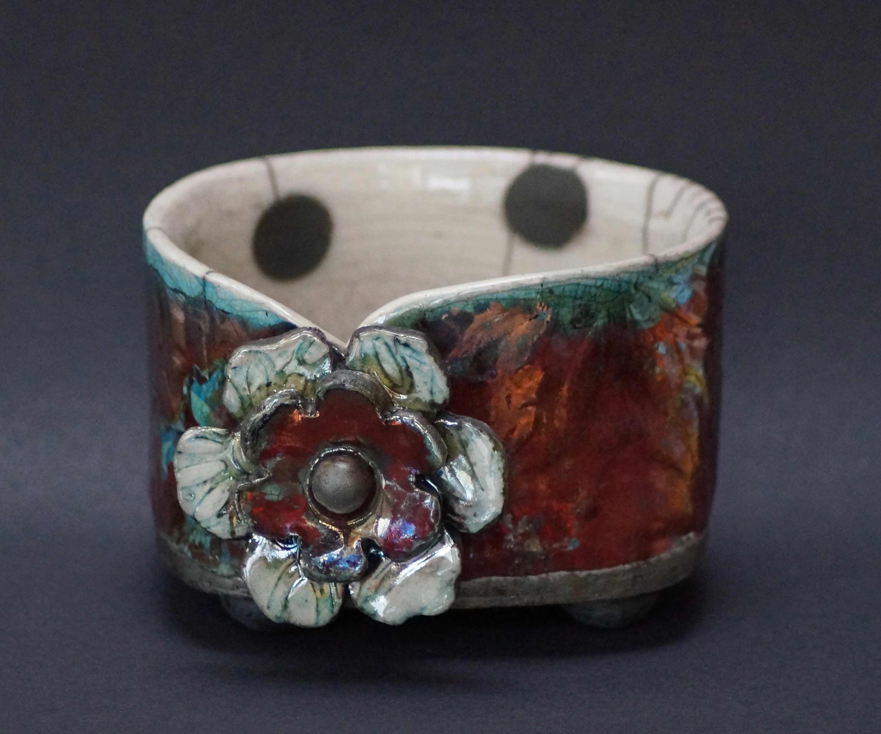 Lustred pot with spotty inside