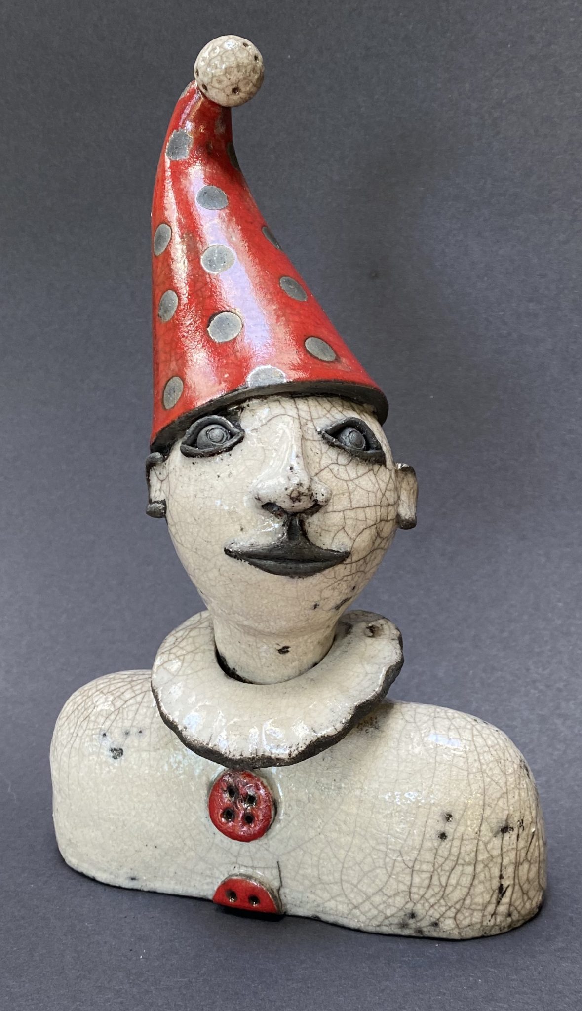 Head with red hat